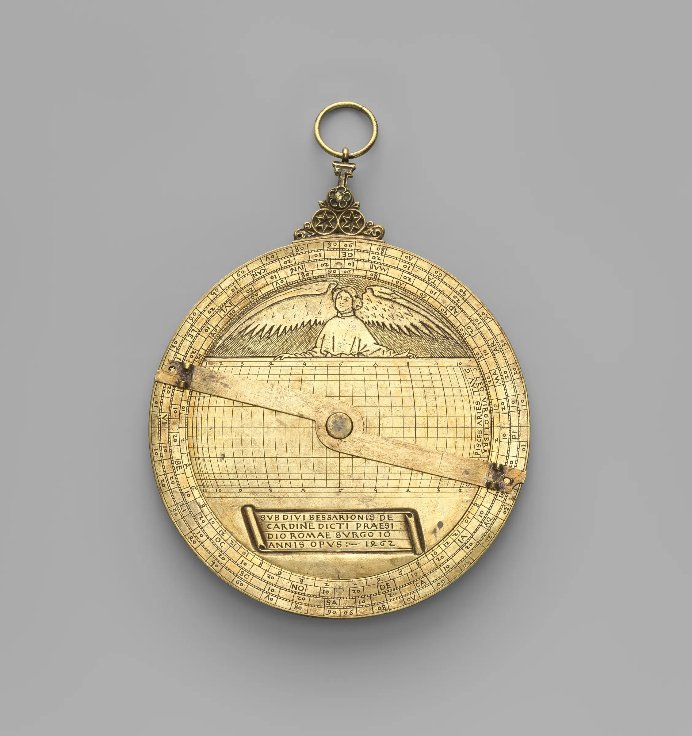 The back of Cardinal Bessarion's astrolabe, engraved with a Latin dedication naming him and dated 1462.